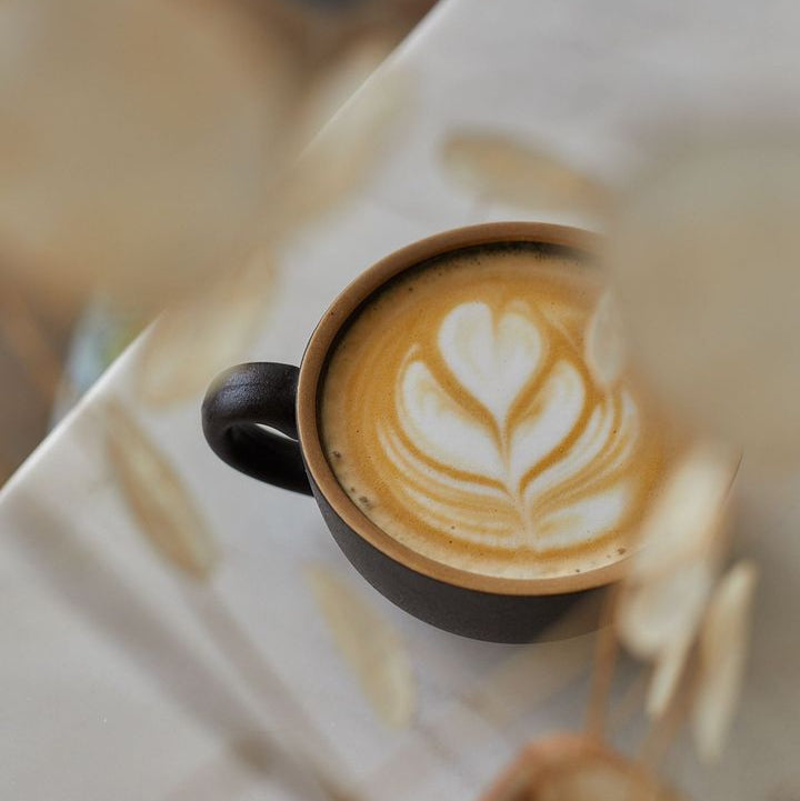 A delicious cup of barista-made coffee with latte art finish